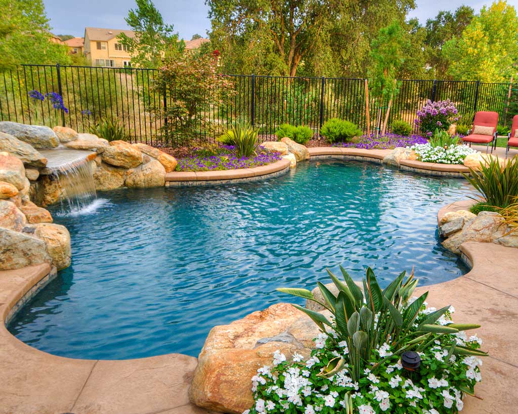 A large Freeform Gunite Pool like this typically costs more. Find out how much inground pool cost will be.